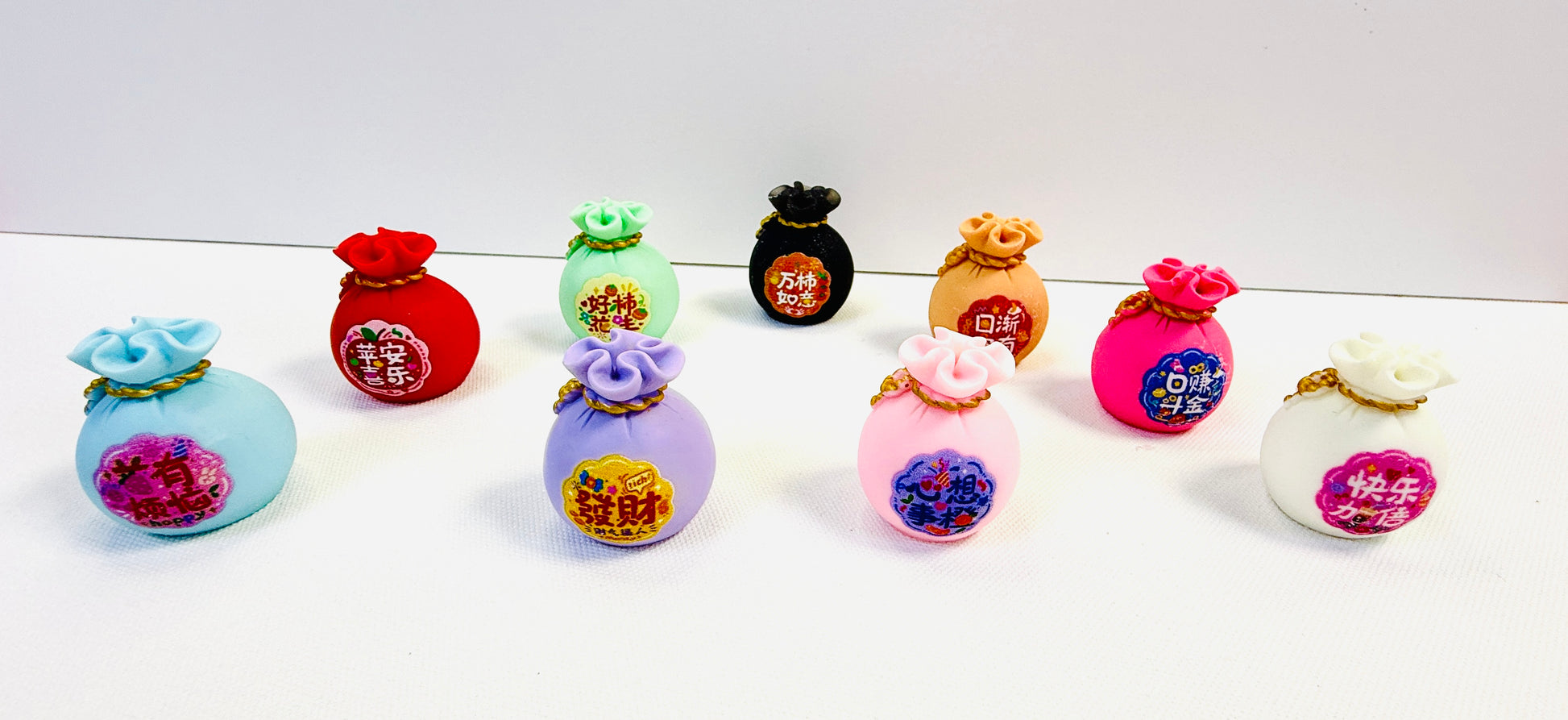 Glowin Resin Money Bag Kiki Figure Blessing Symbols Set 9 Pcs